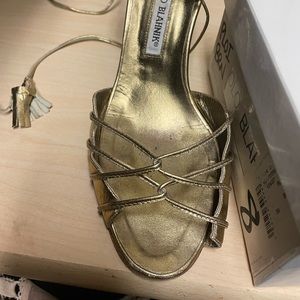 Gold ankle tie shoes, purchased at Saks Fifth Ave. Can be worn day or evening.